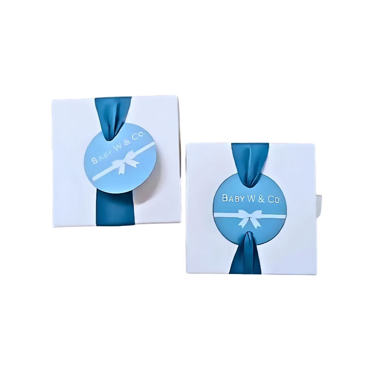 Personalized blue and white baby shower ribbon favors featuring round tags with “Baby W. & Co.” text and white bow designs.
