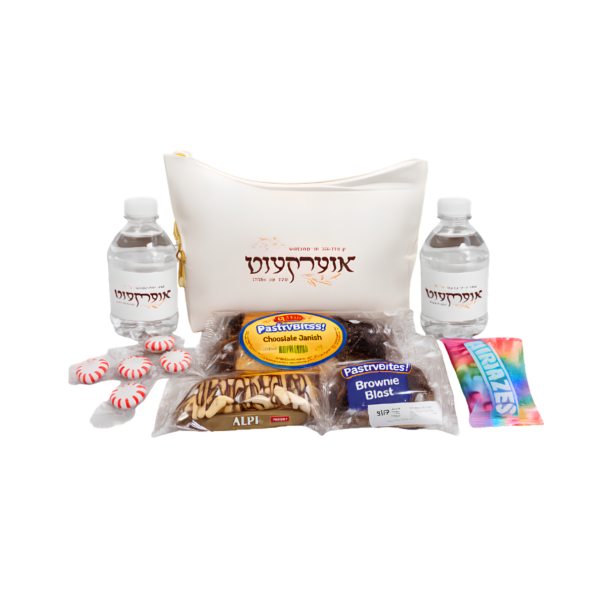Personalized gift basket featuring a white decorative pillow, two matching bottles, assorted snacks, and packaged treats with Hebrew text and colorful labels.