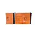 Brown personalized gift box featuring a centered custom text panel and matching minimalist geometric logo designs on the front.
